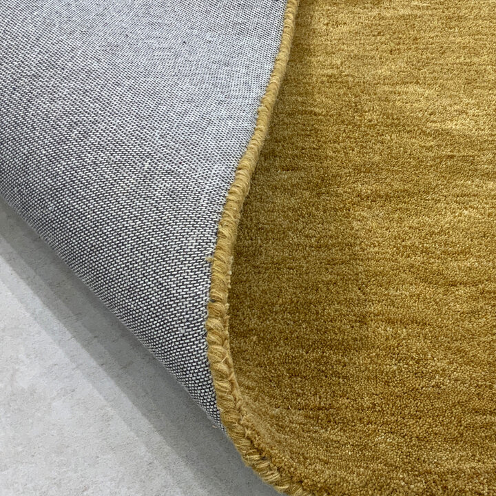 Rond wollen vloerkleed - Leone Goud