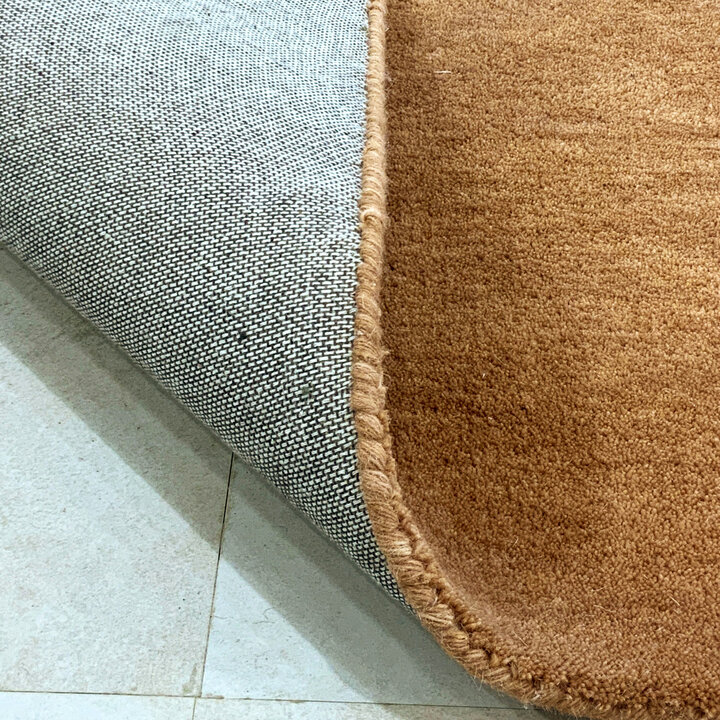 Rond wollen vloerkleed - Leone Bruin