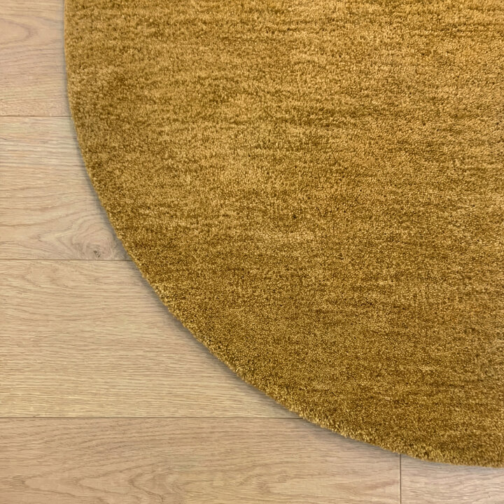 Rond wollen vloerkleed - Leone Goud