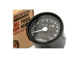 Black mini speedometer with black dial.