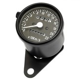 Zwarte mini snelheidsmeter met zwarte wijzerplaat.