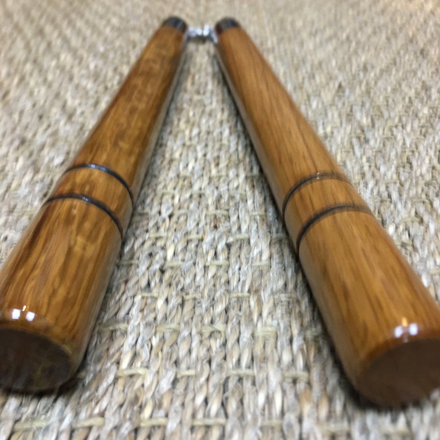 Wooden Nunchaku with two black grooves for excellent grip Enso Martial Arts Shop Bristol
