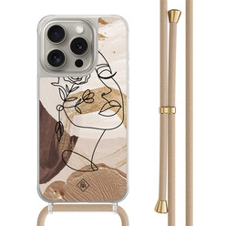 Casimoda iPhone 15 Pro hoesje met beige koord - Abstract gezicht bruin