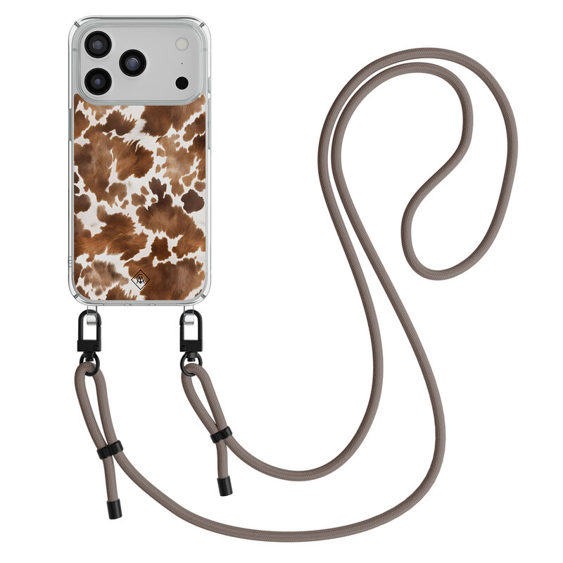 Casimoda Phone 17 Pro hoesje met donkerbruin koord - Koeienprint