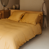 COCO & CICI BAMBOE KUSSENSLOOP OKERGEEL 60X70