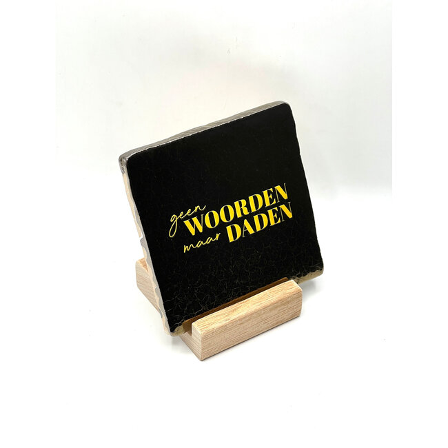 Tegel Geen woorden maar daden goud | Rotterdam