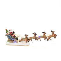 Weihnachtsfigur für drinnen - Weihnachtsmann im Schlitten - 14 x 36 cm