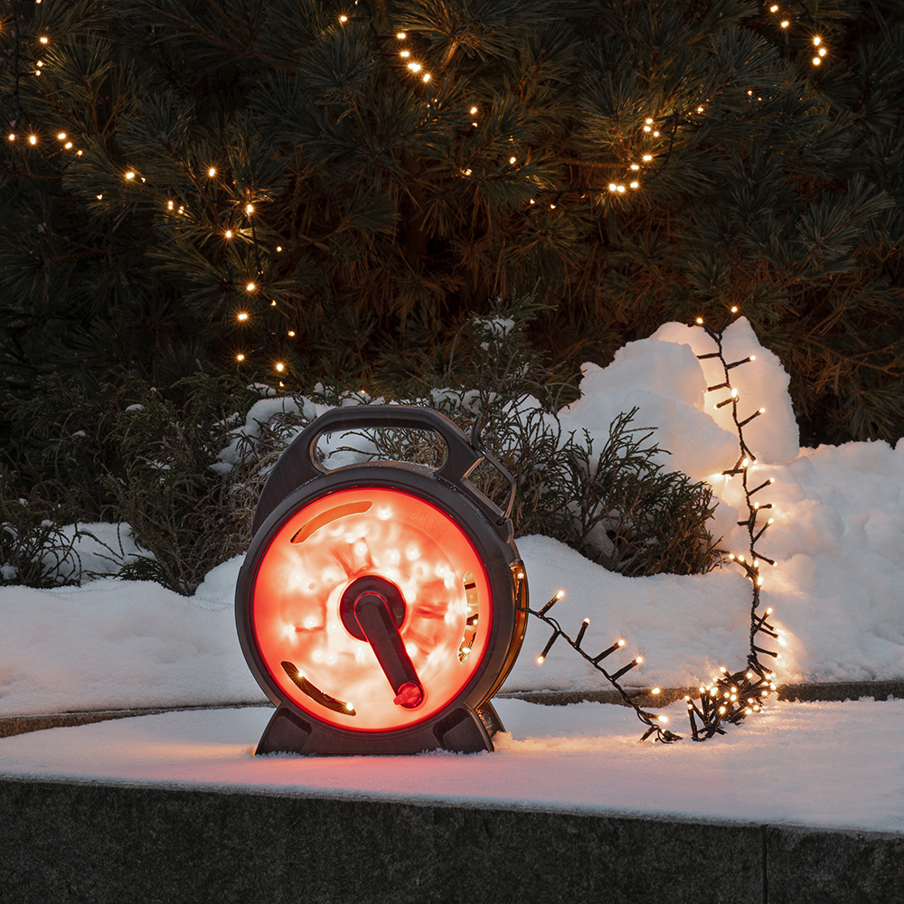 Konstsmide Cluster Lichtsnoer op kabelhaspel voor buiten 600 LEDs 2100K Amber IP44 13,2 meter Kerstverlichting