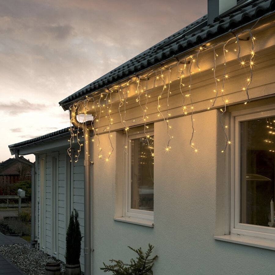 Konstsmide LED Solar Ice Regen lichtgordijn, afstandsbediening, 200 amber diodes, buiten, witte kabel, 2 x lithium batterij / 1 x CR2025 (incl.) - 2777-802SP