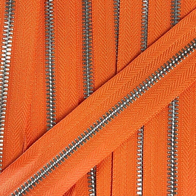 Metalen rits nikkel maat 5 lichtoranje