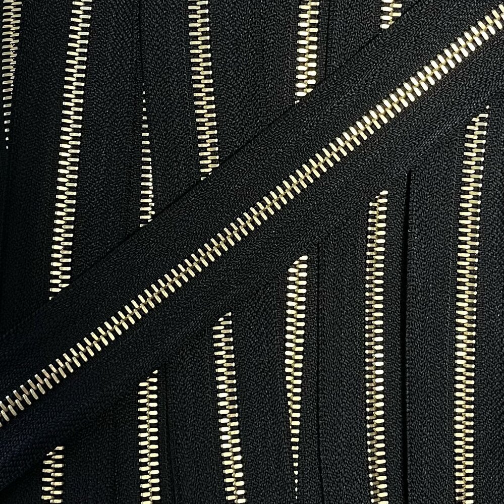 Metalen rits goud maat 5 zwart