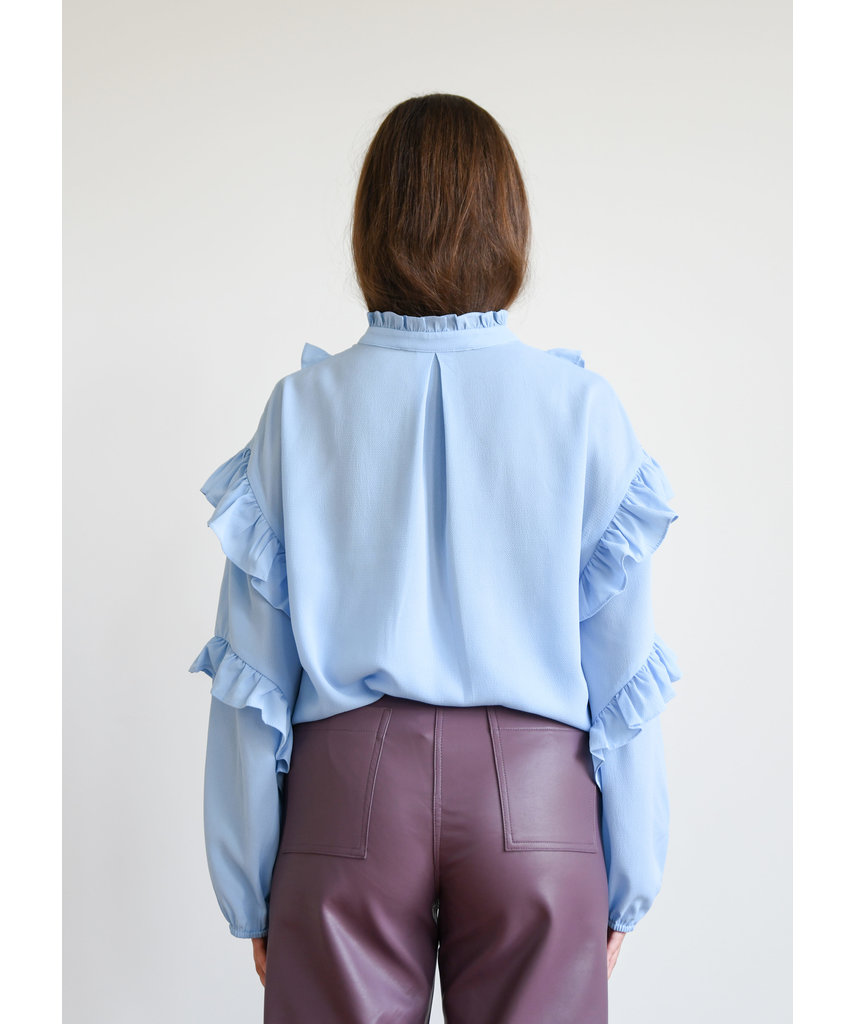 blue ruffle top