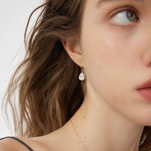 CiCi'De Jewelry Amsterdam Sprankelende waterdruppeloorbellen - 18K goud gevuld