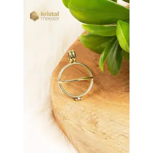 Gold colored cage pendant for ball-shaped gemstone