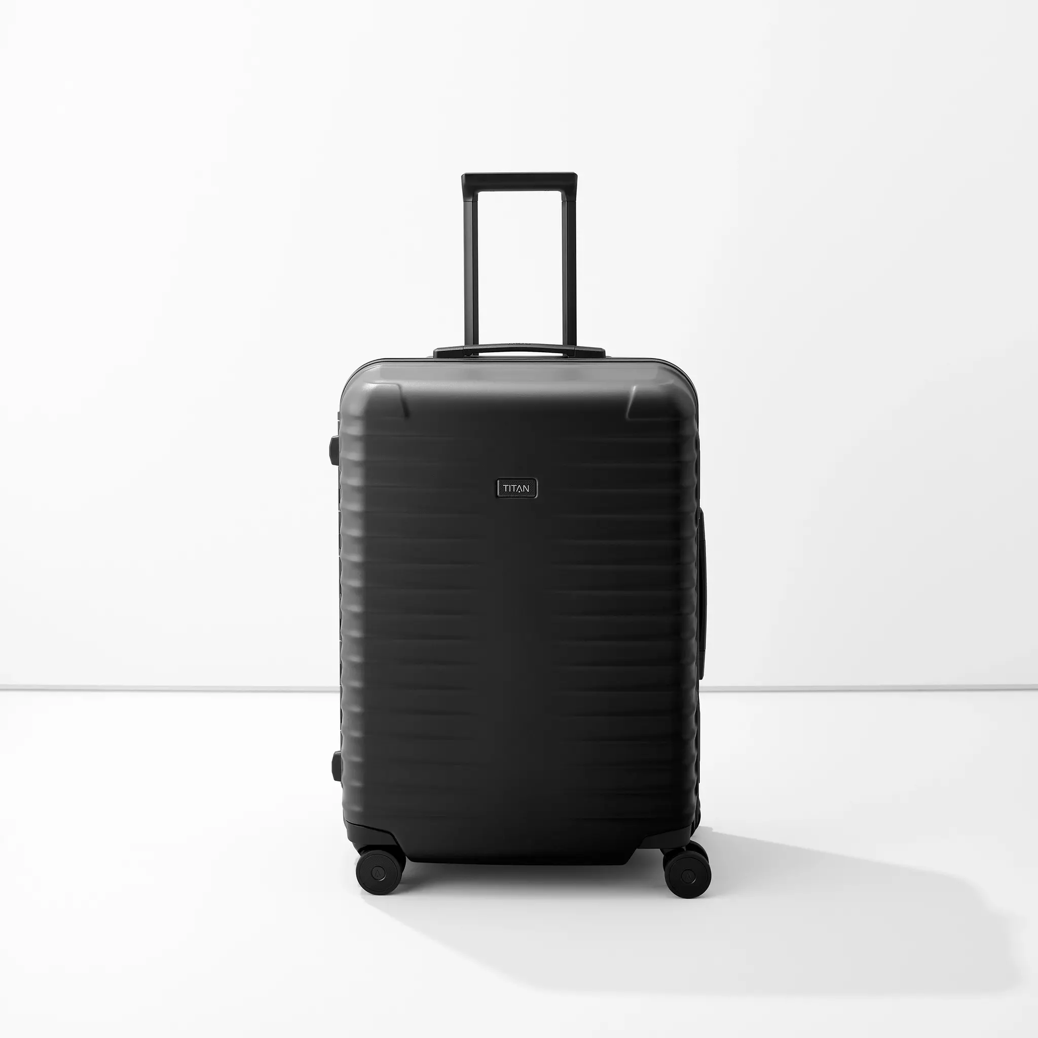 Titan Titan Overseas 4-w trolley M+ 84L zwart