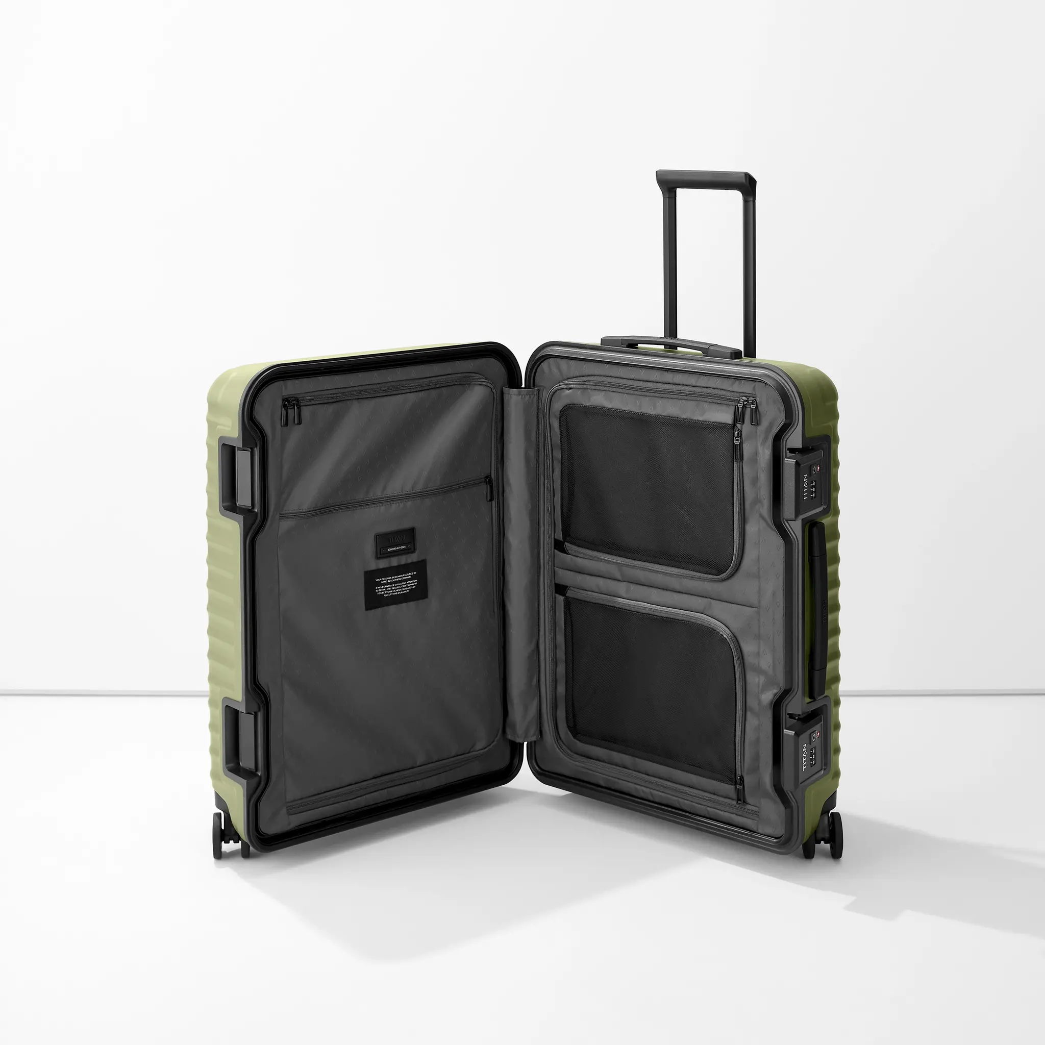 Titan Titan Overseas 4-w trolley M+ 84L groen