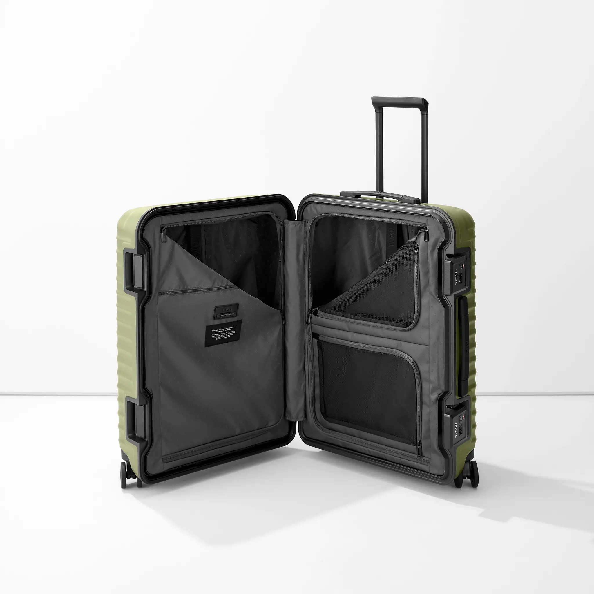 Titan Titan Overseas 4-w trolley M+ 84L groen