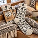 Woolwear of Scandinavia Ecru wollen sokken met schaapmotief Woolwear of Scandinavia Ecru wollen sokken met schaapmotief