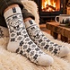 Woolwear of Scandinavia Ecru wollen sokken met schaapmotief Woolwear of Scandinavia Ecru wollen sokken met schaapmotief