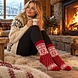 Woolwear of Scandinavia Rode wollen sokken met sneeuwvlokpatroon