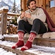 Woolwear of Scandinavia Rode wollen sokken met sneeuwvlokpatroon
