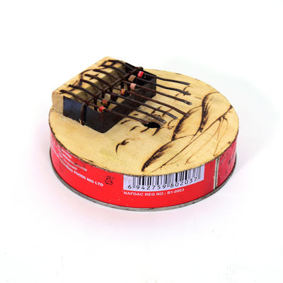 Kalimba van conservenblik, rond model, 7 tonen