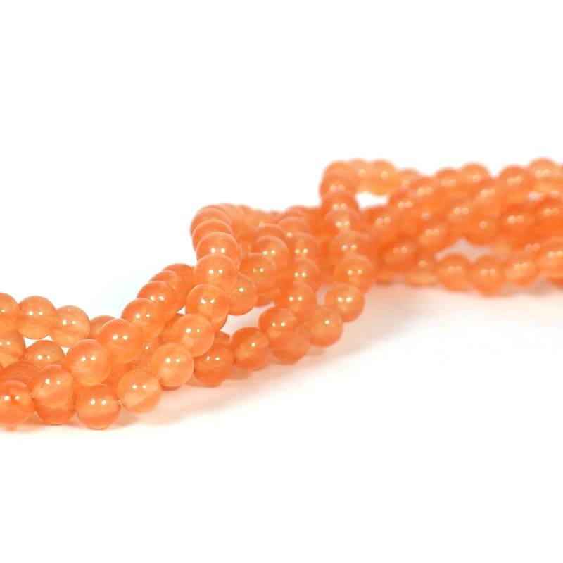 Jade kralen 6 mm rond light salmon (streng)