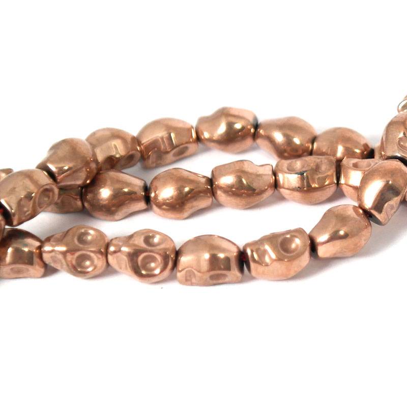 Hematiet kralen rose gold plated skull (streng)