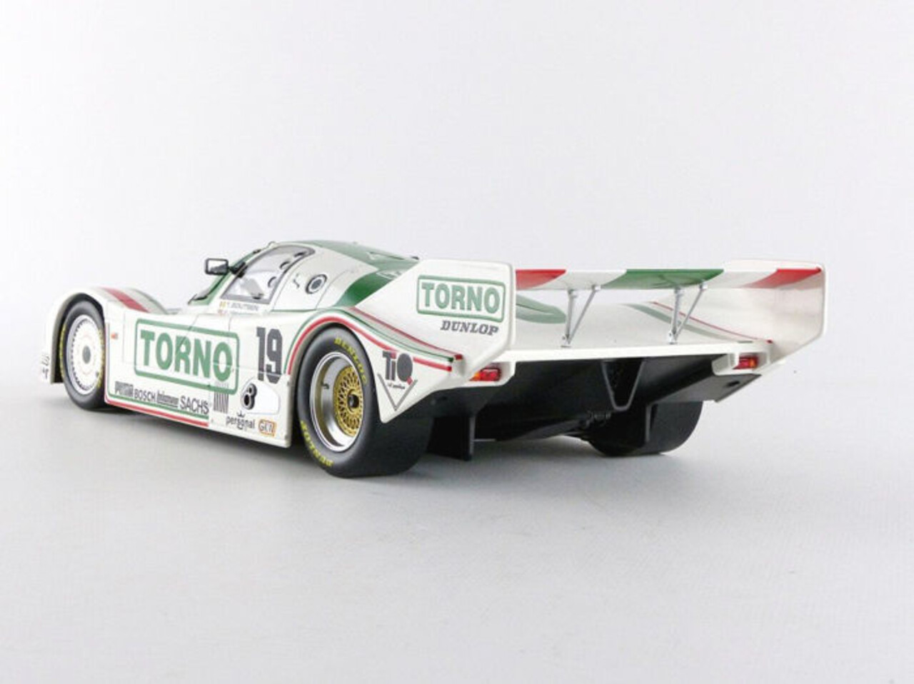 Porsche Porsche 962 C #19 3rd Place 1000km Mugello 1985 - 1:18 - Norev