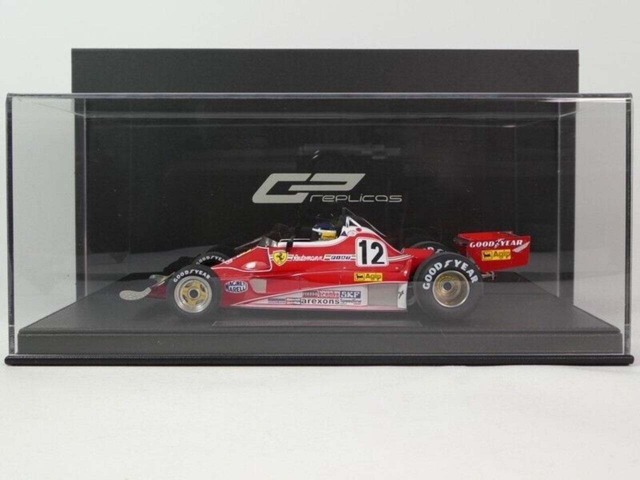 Formule 1 Ferrari 312 T3 #12 Winner GP Canada 1978 + Pilot Figure G. Villeneuve  - 1:18 - GP Replicas Formule 1 Ferrari 312 T3 #12 Winner GP Canada 1978 + Pilot Figure G. Villeneuve  - 1:18 - GP Replicas