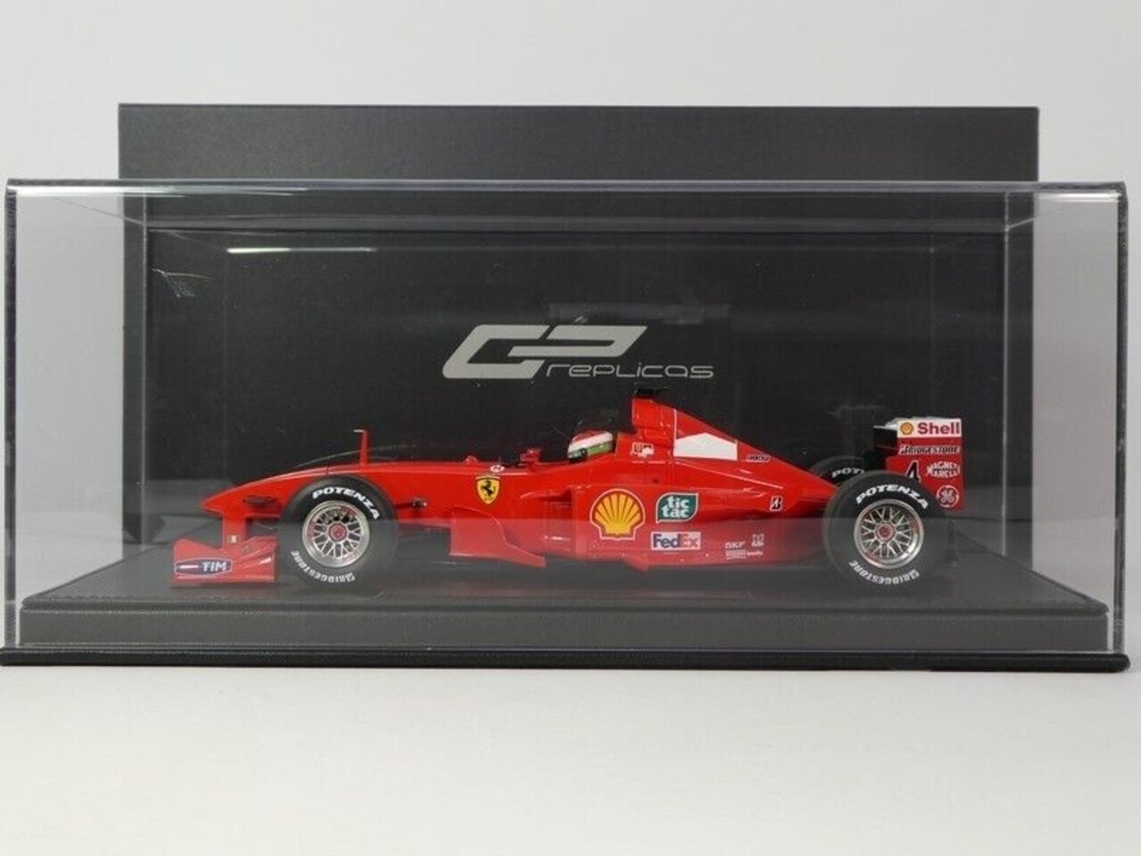 Formule 1 Ferrari 399 Scureria Ferrari #4 2nd GP Monaco 1999 + Pilot Figure Eddie Irvine - 1:18 - GP Replicas Formule 1 Ferrari 399 Scureria Ferrari #4 2nd GP Monaco 1999 + Pilot Figure Eddie Irvine - 1:18 - GP Replicas
