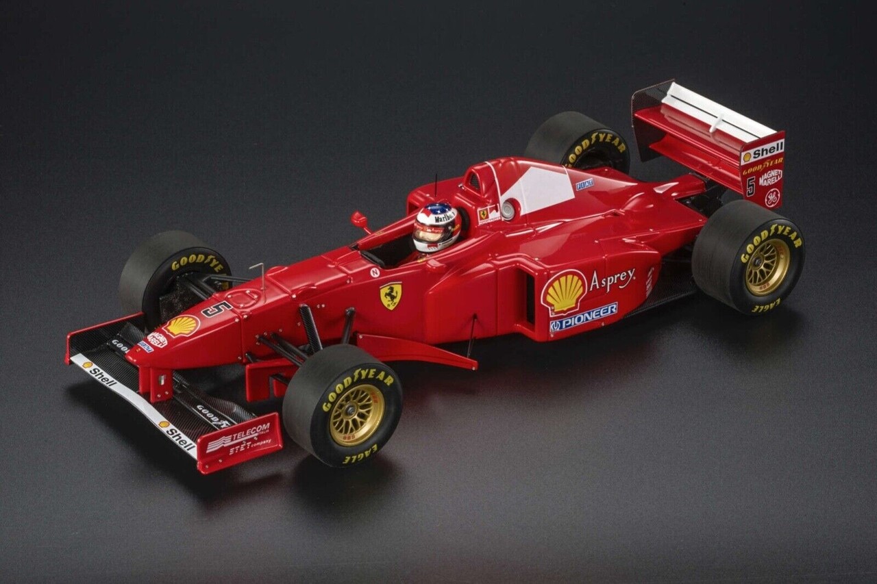 Formule 1 Ferrari 310B #5 Team Scuderia Ferrari Marlboro Winner GP Canada 1997 + Pilot Figure M.Schumacher- 1:18 - GP Replicas Formule 1 Ferrari 310B #5 Team Scuderia Ferrari Marlboro Winner GP Canada 1997 + Pilot Figure M.Schumacher- 1:18 - GP Replicas