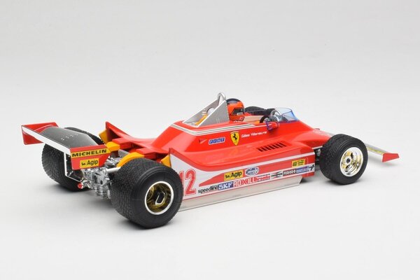 Formule 1 Ferrari F1 312T4 #12 Winner GP Watkins Glen USA (G.Villeneuve)) + Pilot Figure + Rain Wheels  -1:18 - Bburago