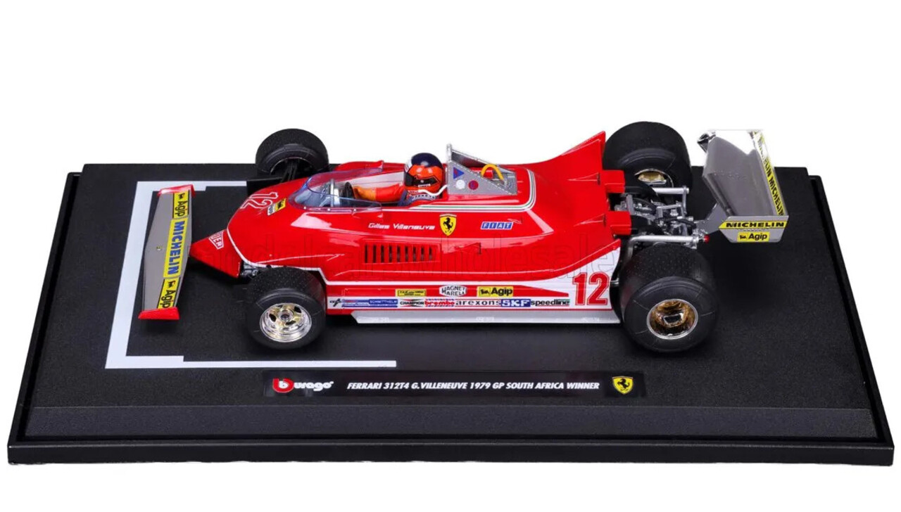 Formule 1 Ferrari F1 312T4 #12 Winner GP South Africa + Pilot Figure (G.Villeneuve) - 1:18 - Bburago