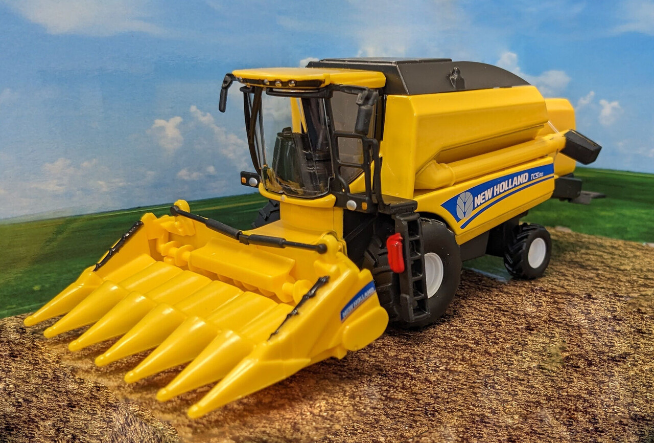 New Holland New Holland TCS.90 Combine Harvester + Corn Header 2020 - 1:50 - Bburago New Holland New Holland TCS.90 Combine Harvester + Corn Header 2020 - 1:50 - Bburago
