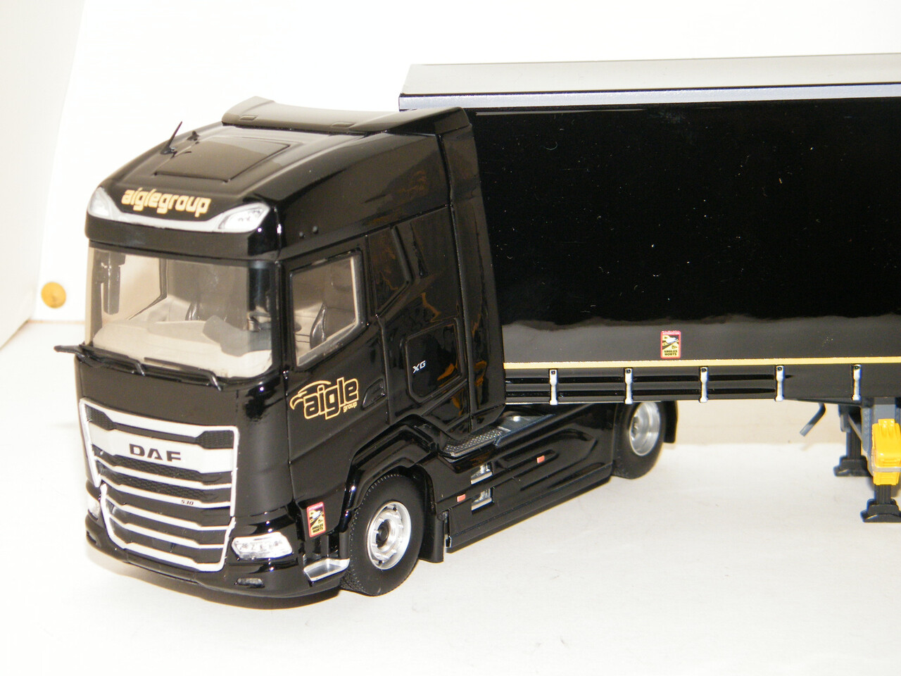 DAF DAF XG Tractor 4x2 + Semi Curtainside Semitrailer 3 Axle 'Aigle Group' 2022 - 1:43 - Eligor DAF DAF XG Tractor 4x2 + Semi Curtainside Semitrailer 3 Axle 'Aigle Group' 2022 - 1:43 - Eligor