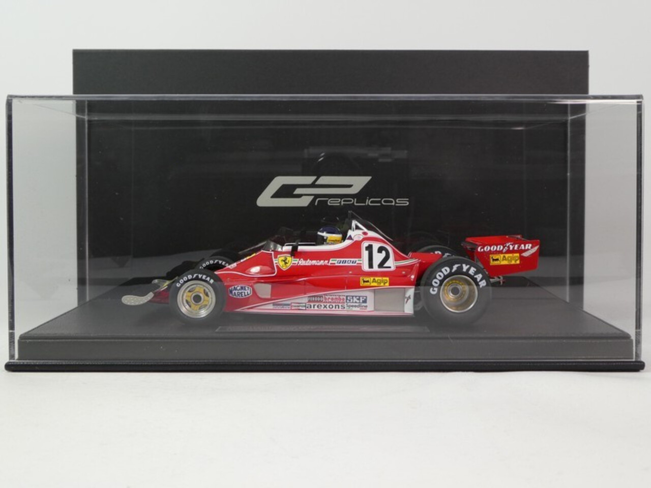 Formule 1 Ferrari 312T2B #12 Team Scuderia Ferrari Spa Sefac Winner GP Brazil + Pilot Figure (C.Reutemann) 1977- 1:18 - GP Replicas