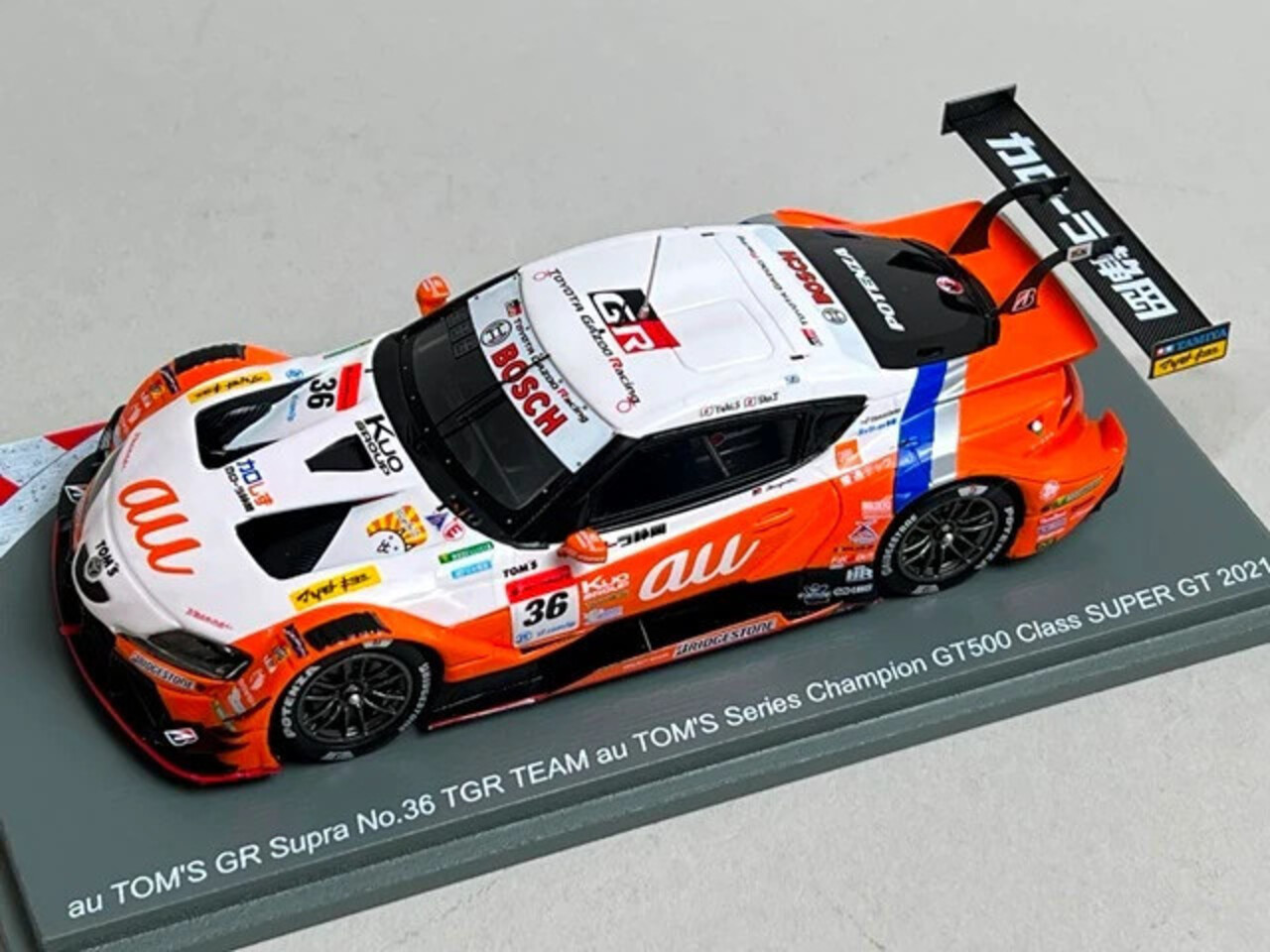 Toyota Toyota Tom's GR Supra #36 Series Champion GT500 Super GT 2021 + Champion Board - 1:43 - Spark Toyota Toyota Tom's GR Supra #36 Series Champion GT500 Super GT 2021 + Champion Board - 1:43 - Spark