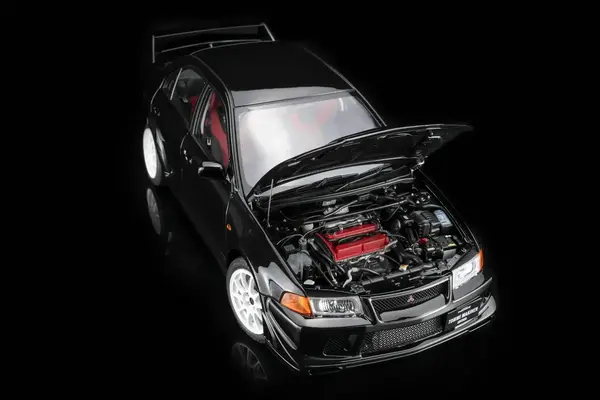 Mitsubishi Mitsubishi Lancer EVO VI GSR Tommy Makinen Edition 2000 - 1:18 - MotorHelix Mitsubishi Mitsubishi Lancer EVO VI GSR Tommy Makinen Edition 2000 - 1:18 - MotorHelix
