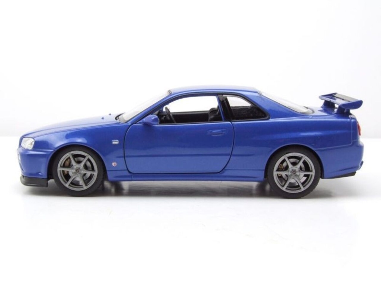 Nissan Nissan Skyline GT-R (R34) RHD -1:24 - Welly Nissan Nissan Skyline GT-R (R34) RHD -1:24 - Welly