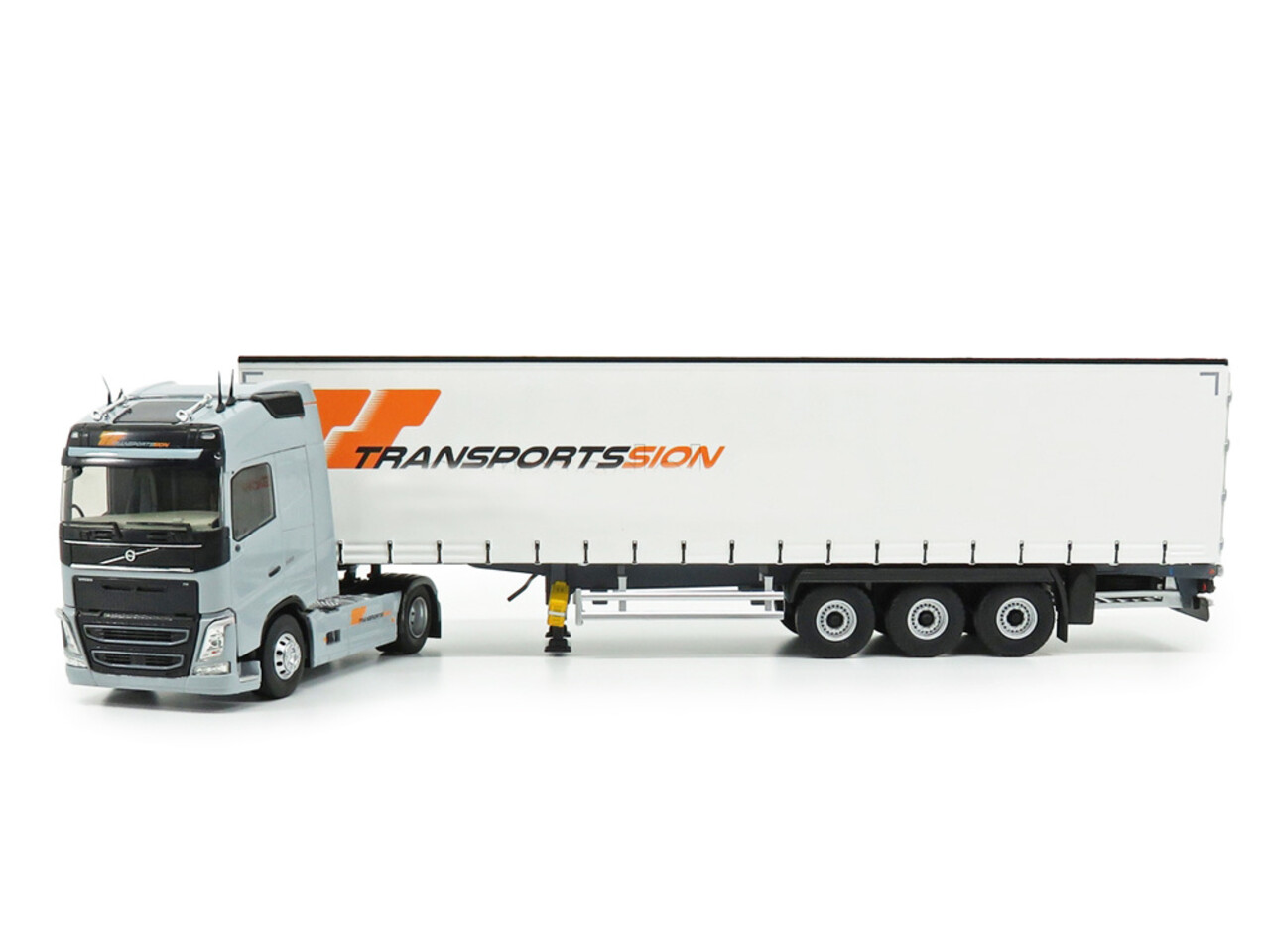 Volvo Volvo FH 500 Globetrotter Truck 4x2 + Curtainside Semitrailer 3 Axle 'Sion Transports' 2016 - 1:43 - Eligor Volvo Volvo FH 500 Globetrotter Truck 4x2 + Curtainside Semitrailer 3 Axle 'Sion Transports' 2016 - 1:43 - Eligor