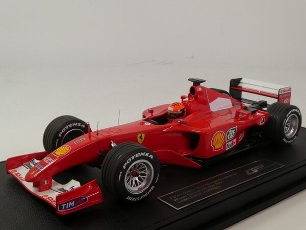 Formule 1 Ferrari F2001 #1 World Champion Winner GP Belgium Spa 2001 + Pilot Driver (M.Schumacher) - 1:18 - GP Replicas Formule 1 Ferrari F2001 #1 World Champion Winner GP Belgium Spa 2001 + Pilot Driver (M.Schumacher) - 1:18 - GP Replicas