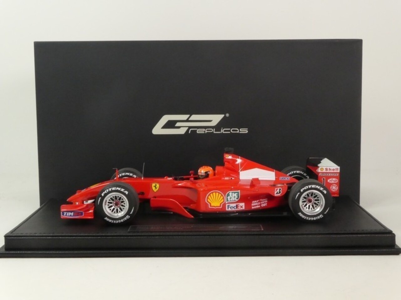 Formule 1 Ferrari F2001 #1 World Champion Winner GP Belgium Spa 2001 + Pilot Driver (M.Schumacher) - 1:18 - GP Replicas Formule 1 Ferrari F2001 #1 World Champion Winner GP Belgium Spa 2001 + Pilot Driver (M.Schumacher) - 1:18 - GP Replicas