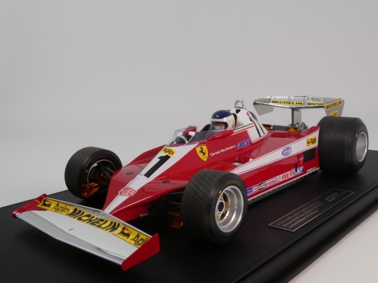 Formule 1 Ferrari 312T3 #11 Winner British GP 1978 + Pilot Figure (C. Reutemann) - 1:12 - GP Replicas Formule 1 Ferrari 312T3 #11 Winner British GP 1978 + Pilot Figure (C. Reutemann) - 1:12 - GP Replicas