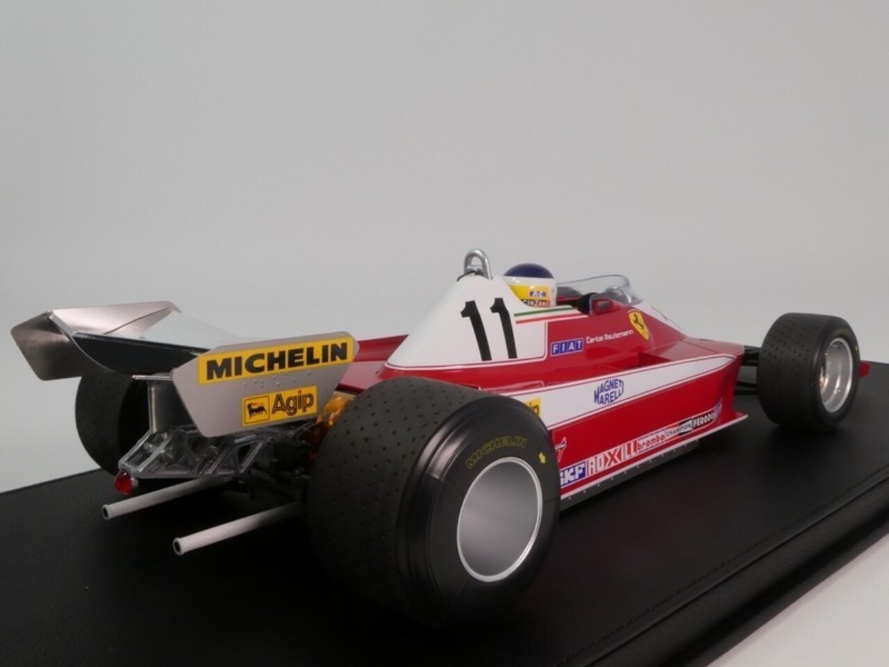 Formule 1 Ferrari 312T3 #11 Winner British GP 1978 + Pilot Figure (C. Reutemann) - 1:12 - GP Replicas Formule 1 Ferrari 312T3 #11 Winner British GP 1978 + Pilot Figure (C. Reutemann) - 1:12 - GP Replicas