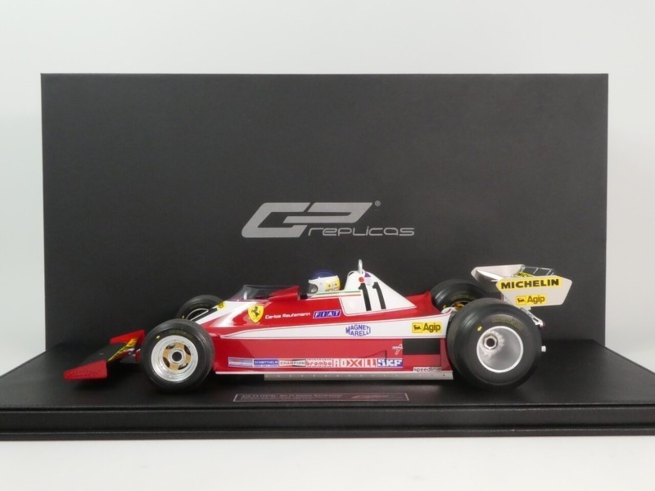 Formule 1 Ferrari 312T3 #11 Winner British GP 1978 + Pilot Figure (C. Reutemann) - 1:12 - GP Replicas Formule 1 Ferrari 312T3 #11 Winner British GP 1978 + Pilot Figure (C. Reutemann) - 1:12 - GP Replicas