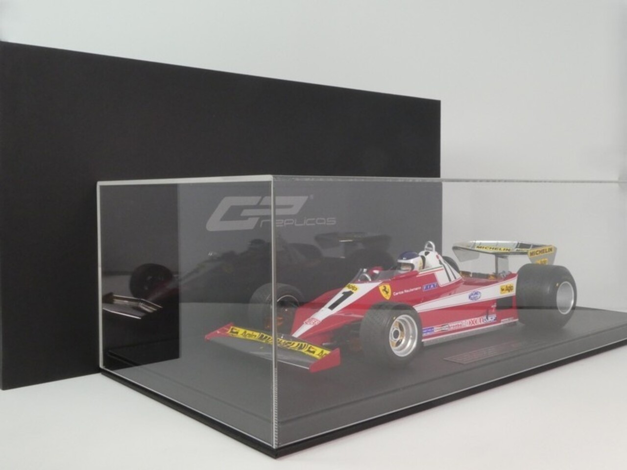 Formule 1 Ferrari 312T3 #11 Winner British GP 1978 + Pilot Figure (C. Reutemann) - 1:12 - GP Replicas Formule 1 Ferrari 312T3 #11 Winner British GP 1978 + Pilot Figure (C. Reutemann) - 1:12 - GP Replicas