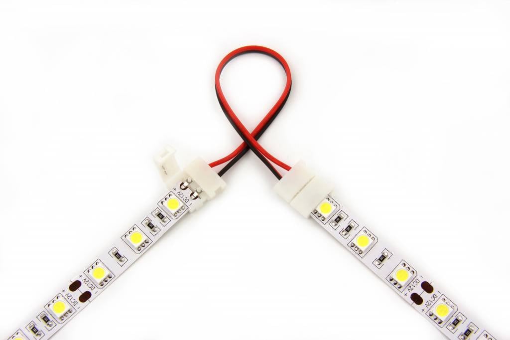 Flexible solderfree interconnect for two parts LED ribbon