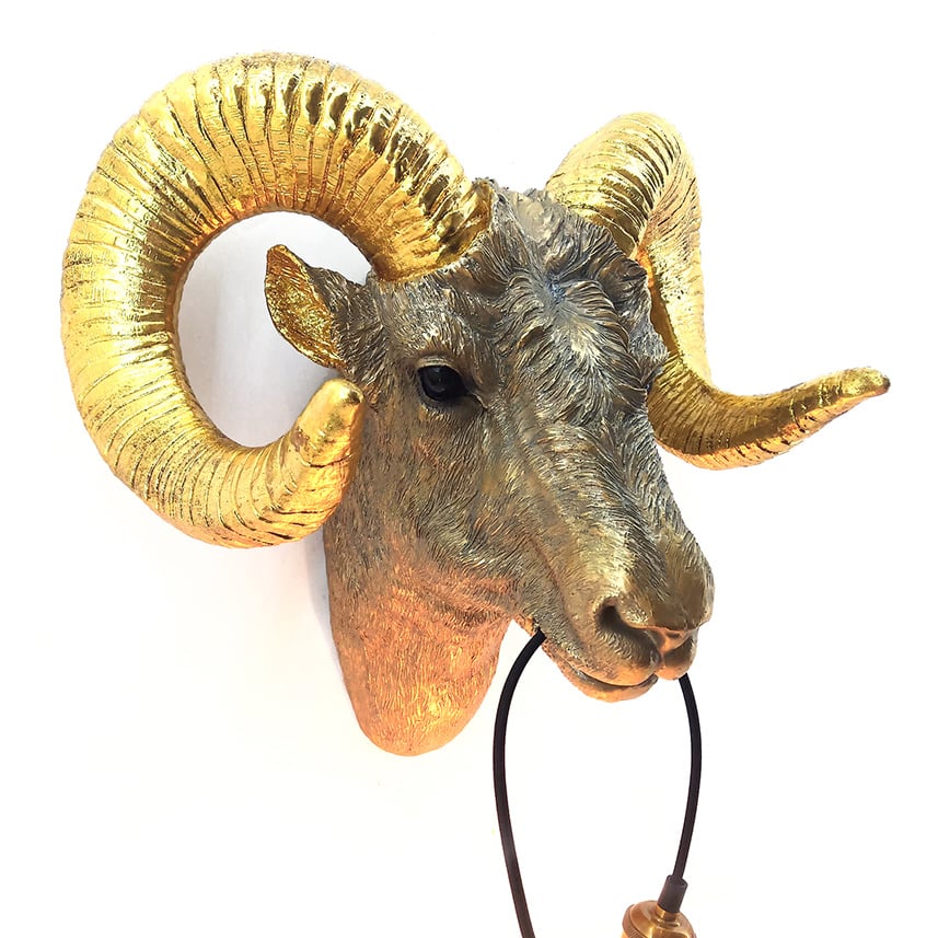 Gold ram or sheep head wall light