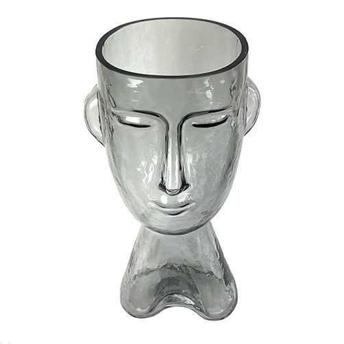 Design vaas van glas in de vorm van een hoofd